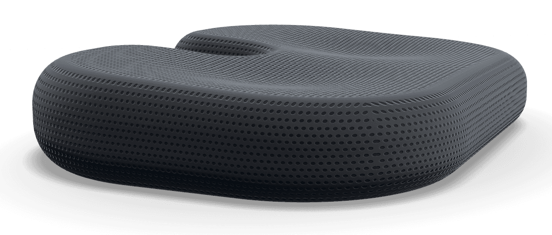 Black cushion from the side, showing the contoured shape
